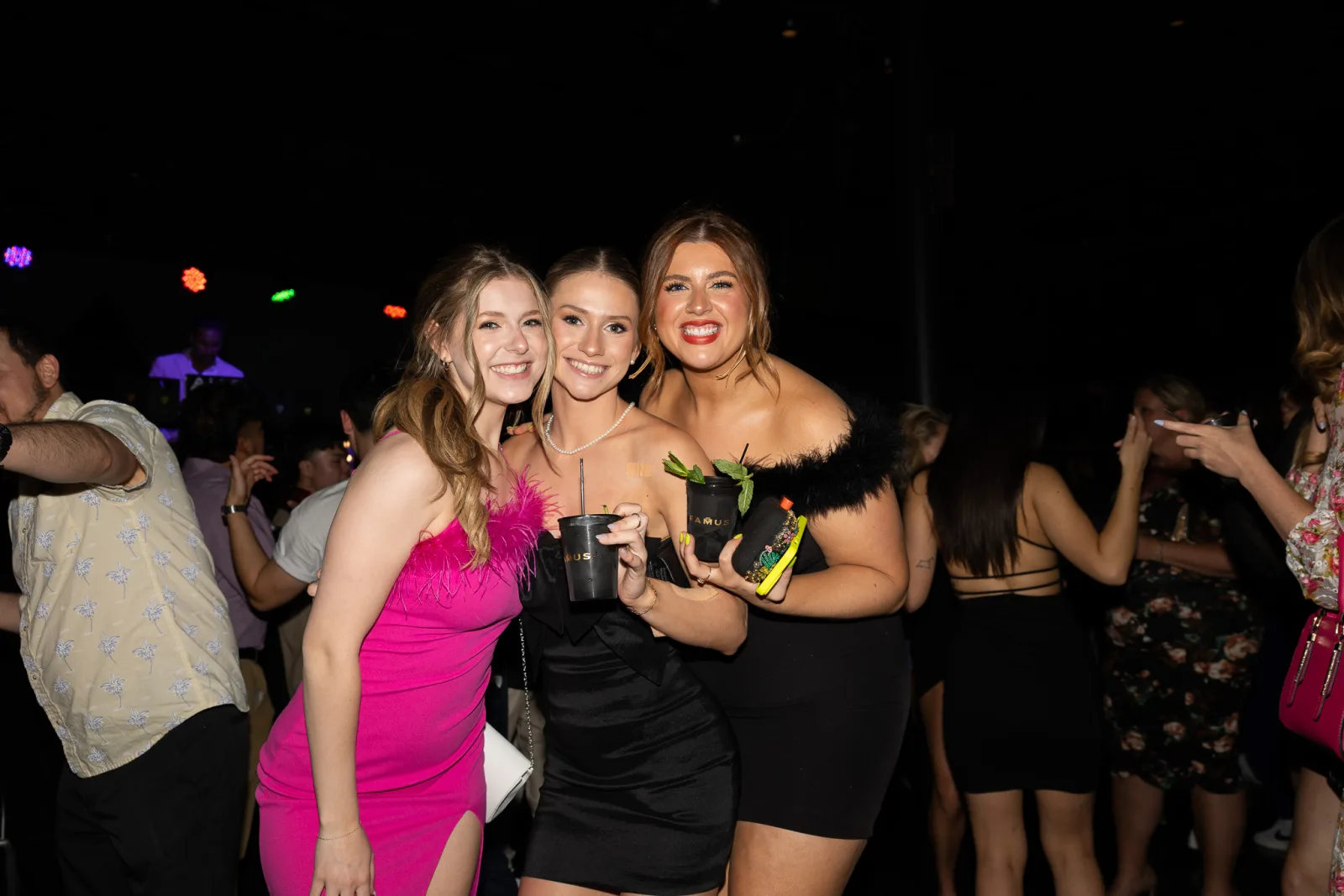 Friends with FAMUS drinks at the launch party